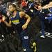 Michigan sophomore Trey Burke high fives fans as he takes the court for an open practice at the Palace on Tuesday, March 20, 2013 in Auburn Hills.  Melanie Maxwell I AnnArbor.com